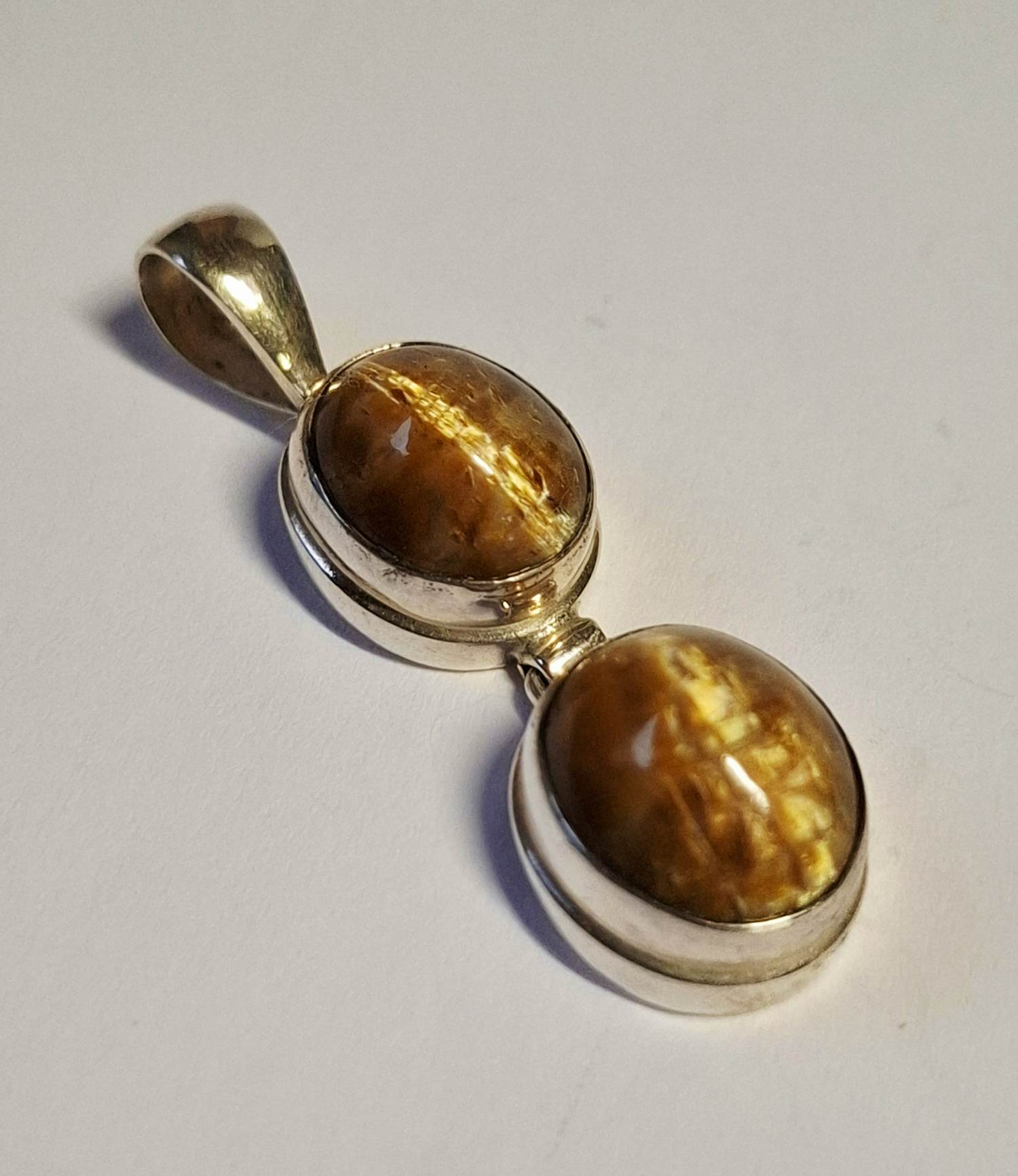 Nieuwe langwerpige zilveren hanger met een mooie  tijgerogen kopen? Bied vanaf 70!