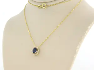 14k geelgouden collier met hanger met saffier en diamant 0.08ct - 45cm kopen? Bied vanaf 230!