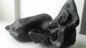 Brons (Onbekend) - liggend lezende vrouw JVG kopen? Bied vanaf 39!