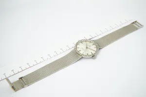 Vintage sixties Omega 18 Krt witgoud & diamant "buddy Holly" horloge - 40 brilj. kopen? Bied vanaf 1760!