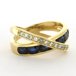 18k gouden ring met saffier en briljant geslepen diamant tot. 0.30ct kopen? Bied vanaf 910!