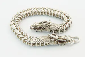 74 - Zware en aparte 2e gehalte zilveren dragon of draken armband kopen? Bied vanaf 90!