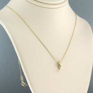 14k collier met solitair hanger bezet met briljant geslepen diamant 0,10ct kopen? Bied vanaf 160!