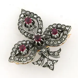 18k gouden broche bezet met robijn en diamant kopen? Bied vanaf 1200!
