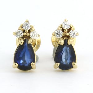 14k geelgouden oorknoppen bezet met saffier 1,20ct en briljant geslepen diamant kopen? Bied vanaf 260!