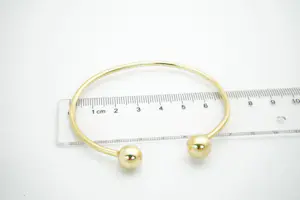 10 - Elegante 18 karaats geel-gouden "bolletjes" armband gekeurd kopen? Bied vanaf 620!