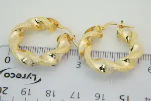 80- paar 18 Krt geel gouden holle & "gedraaide" oorringen kopen? Bied vanaf 200!