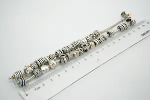 11- TWEE (2) Massief 1e ghlt zilveren PANDORA bedel armbanden - totaal 35 bedels kopen? Bied vanaf 200!