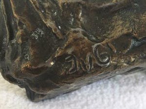 Brons (Onbekend) - liggend lezende vrouw JVG kopen? Bied vanaf 39!