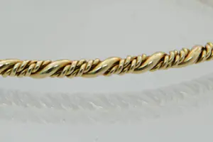 4 - Fraai afgewerkte 14Krt geel gouden  armband - gedraaid model kopen? Bied vanaf 395!
