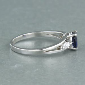 18k gouden ring bezet met saffier en markies geslepen diamant tot. 0.20ct kopen? Bied vanaf 420!