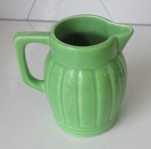 Niet of onleesbaar gesigneerd - Art deco licht groene aardewerken kan van Orchies model N3 kopen? Bied vanaf 1!