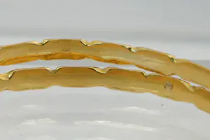 41 - Set van TWEE hoog-gehalte 22Krt geel- gouden "rinkel" armbanden kopen? Bied vanaf 930!