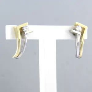 14k bicolour gouden oorknoppen bezet met briljant geslepen diamant tot. 0,10ct kopen? Bied vanaf 310!