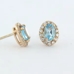 14k rosé gouden entourage oorknoppen met topaas en briljant geslepen diamant kopen? Bied vanaf 375!