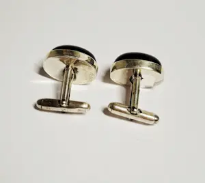 Zilveren manchetknopen ingelegd met Zwarte bolvormig onyx kopen? Bied vanaf 55!