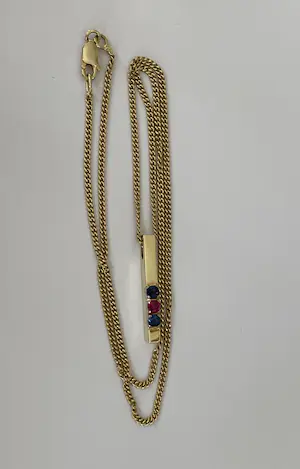 14 kt Geelgouden colier met saffier en robijn kopen? Bied vanaf 350!