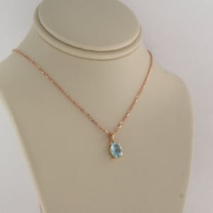 14K Goud - rood gouden collier met hanger bezet met topaas kopen? Bied vanaf 160!