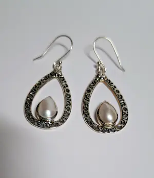 Nieuwe zilveren oorbellen met zoetwater parel kopen? Bied vanaf 40!