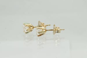 2005- Mooie set 14 krt geel-goud & diamanten (ca.0.70ct) oorstekers kopen? Bied vanaf 730!