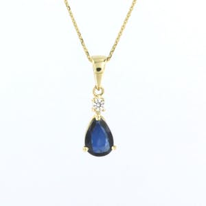 14k gouden collier met hanger bezet met saffier en briljant geslepen diamant kopen? Bied vanaf 200!