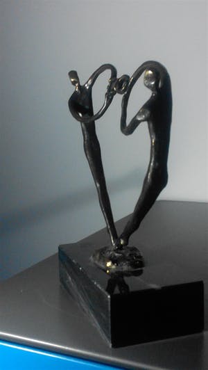 Brons (Onbekend) - twee spelende personen kopen? Bied vanaf 35!