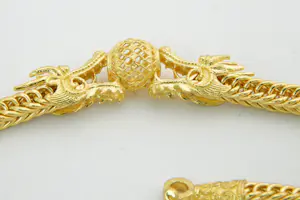 40-  Bijzondere 22Krt geel gouden "Vossestaart" armband met drakenkoppen kopen? Bied vanaf 675!