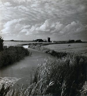 Buy Cas Oorthuys - Noord-Holland met molen in het weiland - originele foto op bariet-fotopapier? Bid from 50!