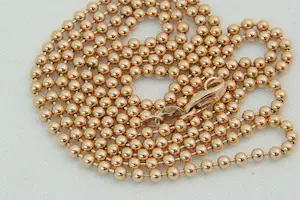 56 - Sierlijk en relatief lang -18 krt - rosé gouden "bolletjes" collier - 60cm kopen? Bied vanaf 540!