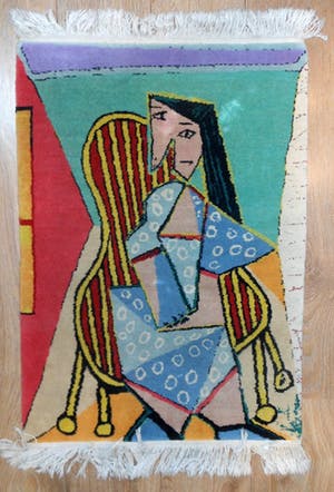 Niet of onleesbaar gesigneerd - Picasso vloerkleed vrouw op stoel kopen? Bied vanaf 10!