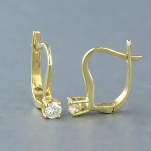 Acheter18k gouden solitair oorhangers met briljant geslepen diamant tot. 0,18ct? Enchérissez de 325!