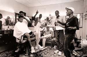 Nico Koster - handgesigneerde foto | 'Dansende mannen bij de kapper in Cuba' | 1999 verkocht voor € 75!