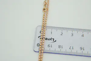 56 - Sierlijk en relatief lang -18 krt - rosé gouden "bolletjes" collier - 60cm kopen? Bied vanaf 540!