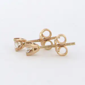 18k rosé gouden solitair oorknoppen met briljant geslepen diamant tot.0.12ct kopen? Bied vanaf 200!