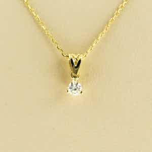 14k collier met solitair hanger bezet met briljant geslepen diamant 0,10ct verkocht voor € 160!