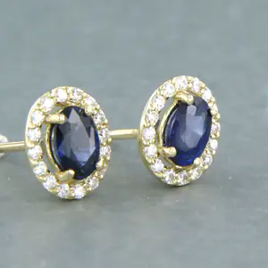 14k gouden oorknoppen met saffier en geslepen diamanten tot. 0,20ct kopen? Bied vanaf 280!