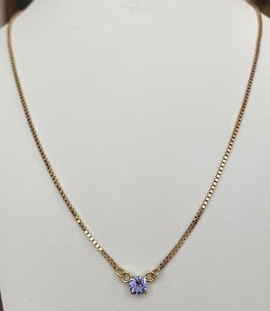 14 karaat geel goud collier met  0.60 ct Tanzaniet hanger kopen? Bied vanaf 220!