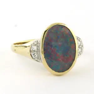 14k bicolour gouden ring met opaal en single cut geslepen diamant tot. 0.05ct kopen? Bied vanaf 485!