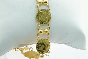 Acheter98 - Sierlijke 20 karaats geel-gouden dames armband - muntjes en balletjes? Enchérissez de 780!