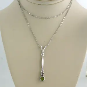 14k gouden collier en hanger met peridot en bolsjewiek geslepen diamant kopen? Bied vanaf 410!