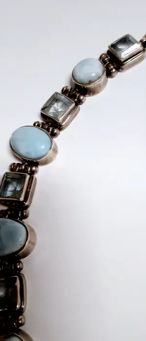 Zilveren Armband bezet met ovale facetgeslepen Aquamarijn en ovale turkoois kopen? Bied vanaf 85!