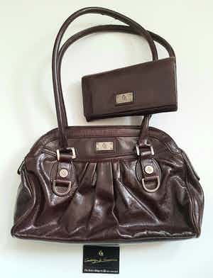 Castelijn & Beerens -  handtas en portemonnee verkocht voor € 1!