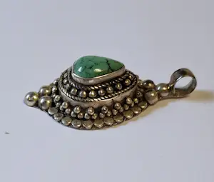 Meer dan 140 jaar Navajo hanger met Turquoise kopen? Bied vanaf 100!
