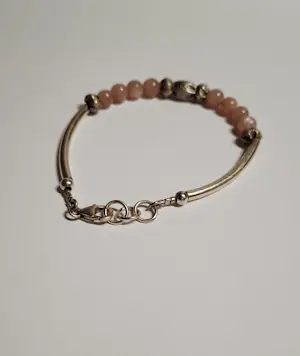 AcheterNieuw mooie zilveren Armband met 8 ronde rozenkwartsen circa? Enchérissez de 55!