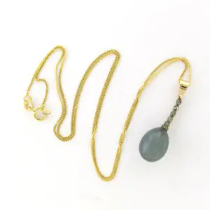 Gouden collier met goud met platina hanger met quartz en diamant kopen? Bied vanaf 240!