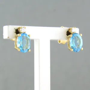 18k gouden oorknoppen bezet met topaas tot. 1,90ct en briljant geslepen diamant kopen? Bied vanaf 260!