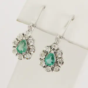 Oorbellen met smaragd en diamanten kopen? Bied vanaf 1250!