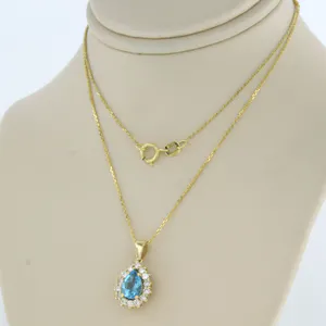 14k gouden collier en hanger bezet met topaas en briljant geslepen diamant kopen? Bied vanaf 320!