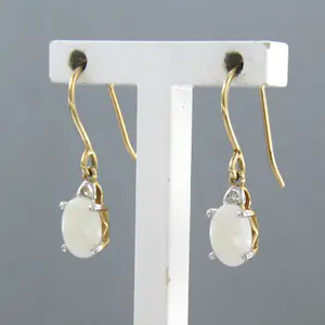 Gele oorhangers (BWG) met opaal en single cut geslepen diamant 0.02ct kopen? Bied vanaf 50!