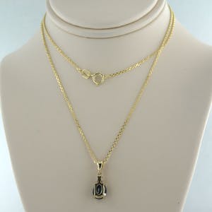 14k geel gouden collier met een hanger bezet met saffier en diamant kopen? Bied vanaf 240!